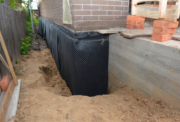 Happy homeowners after waterproofing job in South Bend